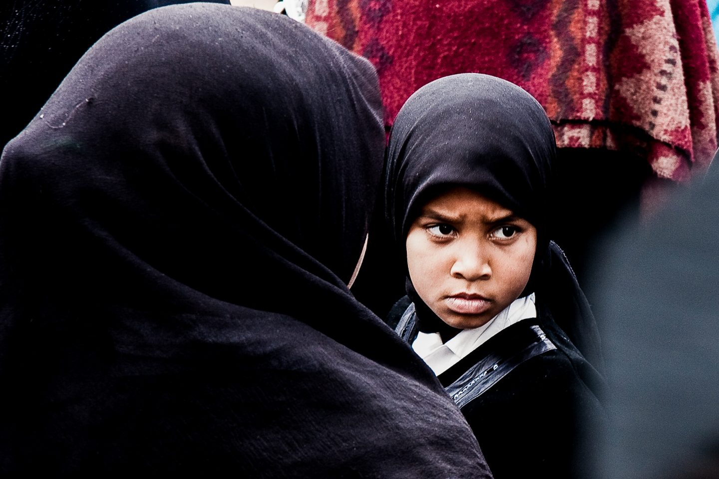 Girl child standing by as the speeches took place.